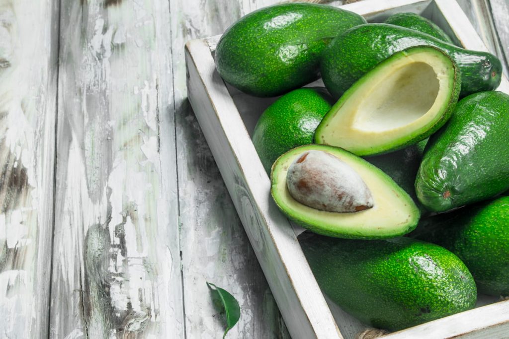 avocado and avocado slices in white dressing